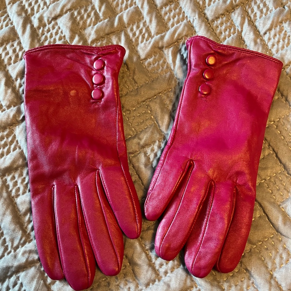 Pink leather gloves.